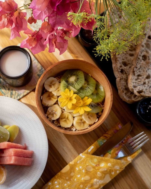 Homemade granola and fresh fruit platter